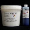 A white plastic bucket labeled "10 lb Kit : Soft 107 – (7 shore A durometer) – Longer Pot Life Mold Making Silicone" and a blue plastic bottle labeled "cat blue slg catalyst" against a black background.