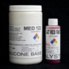 Two containers labeled "2 lb Kit : Medium 122 – (22 shore A durometer) – Fast Curing Mold Making Silicone" and "cat red fast catalyst" against a black background, displaying hazard and company information.