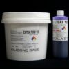 A large white bucket labeled "10 lb Kit : Extra Firm 135 silicone base" next to a purple and white bottle labeled "catalyst," both on a black background.