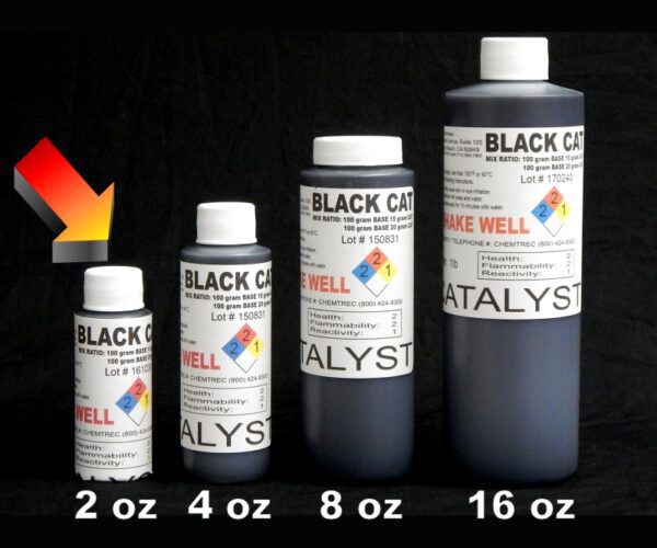 Four 2 oz Black Catalyst ink bottles in varying sizes (2 oz, 4 oz, 8 oz, 16 oz) labeled with detailed product information, arranged in ascending order against a black background.