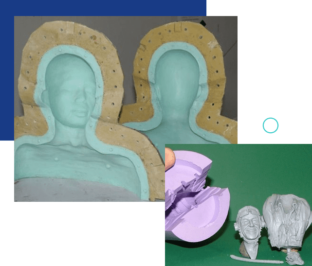 Two bust molds of a person's head, one partial and one full, next to a broken sculpture of a smaller bust with various fragments.