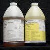 Two large plastic jugs of chemicals labeled "8 lb Kit : MPK-1019 : 3.5 lb Rigid Pour Foam" by pk enterprises, set against a black backdrop.