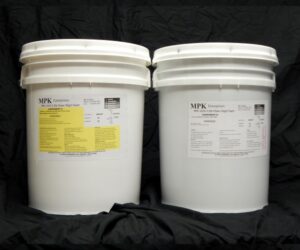 Two 80 lb Kits : MPK-1019 : 3.5 lb Rigid Pour Foam, placed side by side on a black draped background.