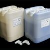 Two large plastic jerrycans labeled a and b, each with a dispensing pump, used for storing and dispensing 80 lb Kit MPK 1125 Duplicating Silicone packaged in pourable jugs with faucets.