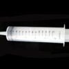 A clear syringe with numbers on it.