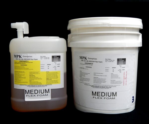 Two large containers of 5 Gal Kit (55 lb) MPK-301 : 6 lb Medium Pour Foam (15 lb A and 40 lb B), labeled with safety and product information, against a black background.