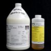 Two containers of 1 Gallon Kit MPK 400-61A-100sec NATURAL adhesive resin, one large and one small, with detailed labels, against a black background.