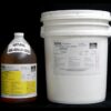 A large white plastic 5 Gal Pail Kit MPK 400-40A-100sec NATURAL next to a brown jug, both labeled "mpk enterprises," on a black background.