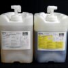 Two large plastic containers with pumps, labeled by mpk enterprises, containing 80 lb Kit : MPK-70 : 10 Min Polyurethane Casting Resin tan, against a black background.