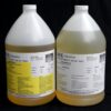 Two large plastic jugs containing 16 lb Kit : MPK-90 : Hi Impact 3 Min. Polyurethane Casting Resin, labeled as component a and component b, against a black background.