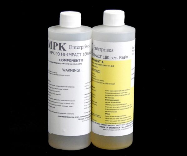 Two bottles labeled as components a and b for 2 lb Kit : MPK-90 : Hi Impact 3 Min. Polyurethane Casting Resin on a black background.