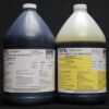 Two large industrial chemical containers labeled "16 lb Kit : MPK-90PB : 3 Min Hi Impact PREMIUM BLACK Polyurethane Casting Resin," one for component a and the other for component b, against a black background.