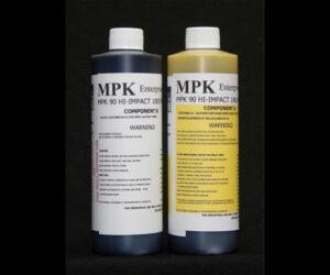 Two bottles labeled component a and component b of 2 lb Kit : MPK-90PB :3 Min Hi Impact PREMIUM BLACK Polyurethane Casting Resin, with detailed product information and warnings, against a black background.