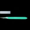 A #11-Blade Disposable Scalpel Qty 10 with a cap lying next to it on a black background.