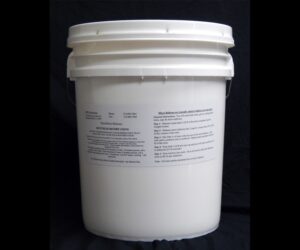 A white bucket with some type of substance inside