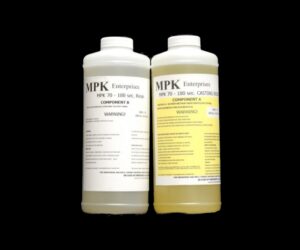 Two bottles labeled 4 lb Kit : MPK-70 : 180 Sec 2 Part Polyurethane Casting Resin components a and b with warning labels, set against a black background.