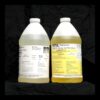 Two jugs of 8 lb Kit : MPK-70 : 180 Sec 2 Part Polyurethane Casting Resin labeled mpk enterprises, one with a white label and the other with a yellow label, against a black background.