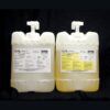 Two large plastic jugs with dispensing pumps, labeled 80 lb Kit MPK-70 : 180 Sec 2 Part Polyurethane Casting Resin, containing a clear yellowish liquid, against a black background.