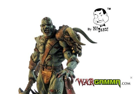 A detailed figurine of a monstrous orc with armor and a sword, branded by mr. dandy and wargamma.com, on a white background.